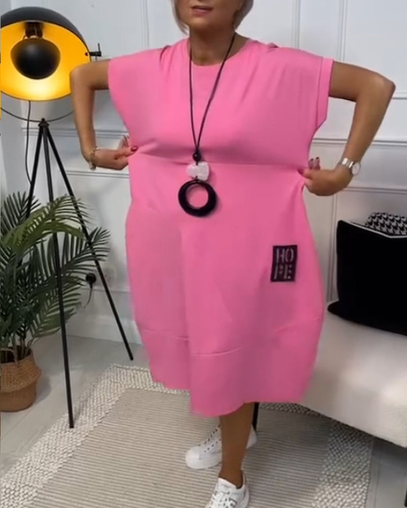 NIPPON™| ブラックの半袖ドレス、「HOPE」モチーフ付き