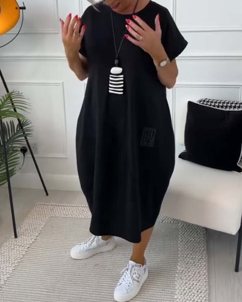 NIPPON™| ブラックの半袖ドレス、「HOPE」モチーフ付き